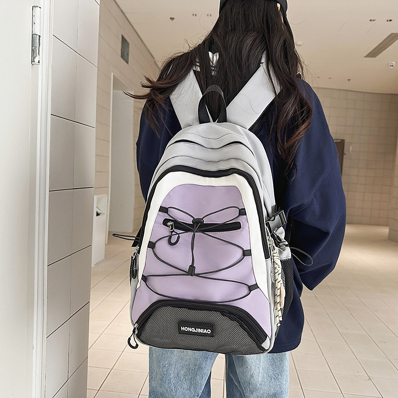 Nuevo estilo de trabajo mochila escolar de estilo de estilo para estudiantes universitarios de moda de alta capacidad mochila de estudiantes de secundaria y secundaria, mochila ligera y versátil