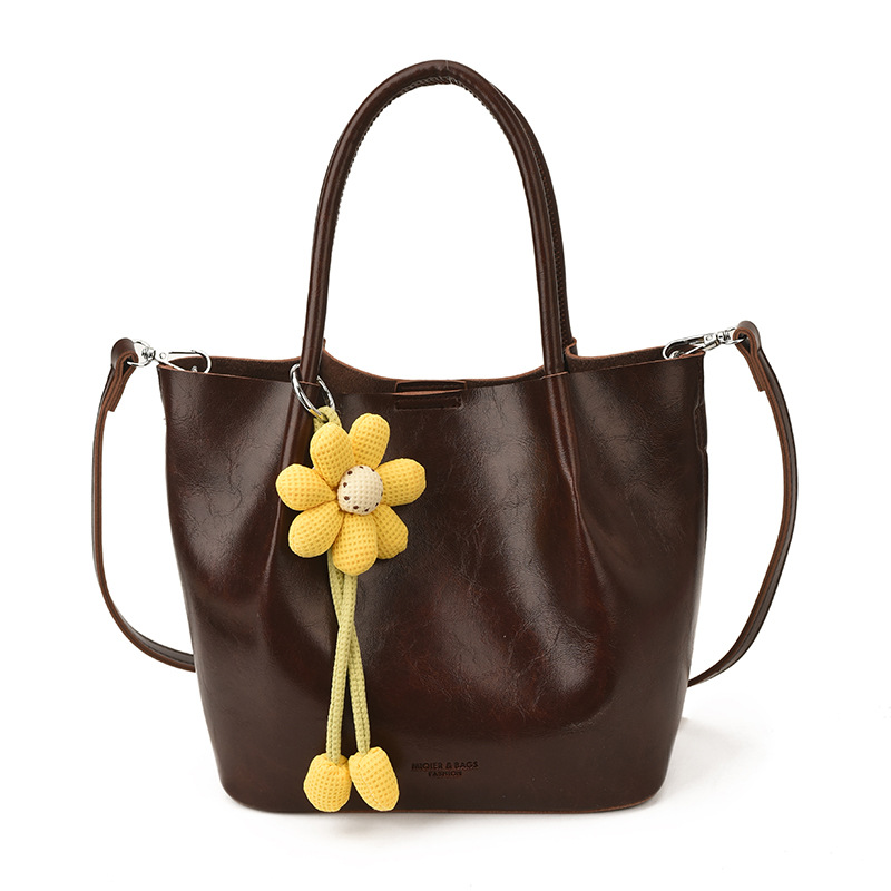 Nicho Zhong canasta de verduras de alto nivel, bolso de cubo, mujer 2025 nuevo retro bolso de trabajo, mochila de viaje