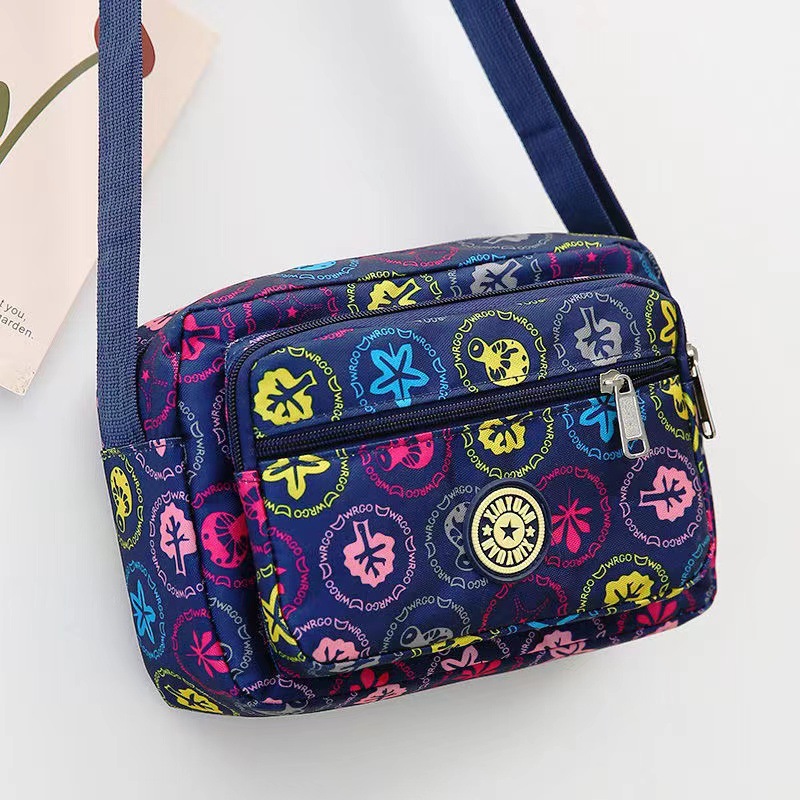 Bolsa de tela de flores bolsa de mensajero de las mujeres nueva bolsa de Madre de gran capacidad bolsa de hombro individual de mediana edad y ancianos bolsa de tela Oxford bolsa