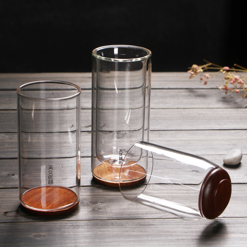 Vidrio transparente grueso resistente al calor inferior de madera aislamiento térmico de doble capa taza de té verde taza de agua creativa flor taza de té Tianjiu glass
