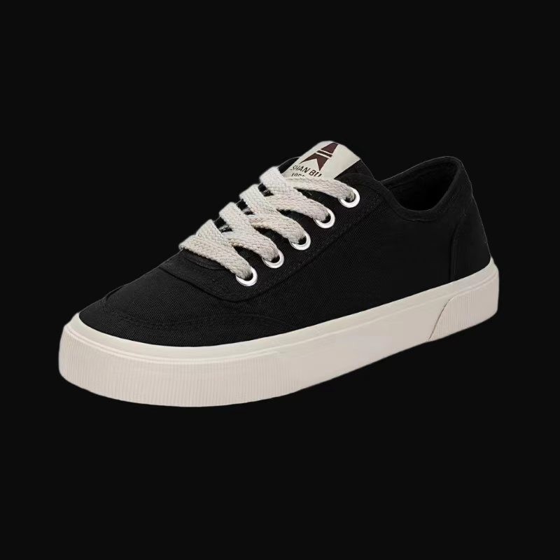 Zapatos de hombre de color sólido zapatos de lona clásicos básicos simples de estilo universal de moda baja zapatos de skate de lazos planos zapatos de mujer