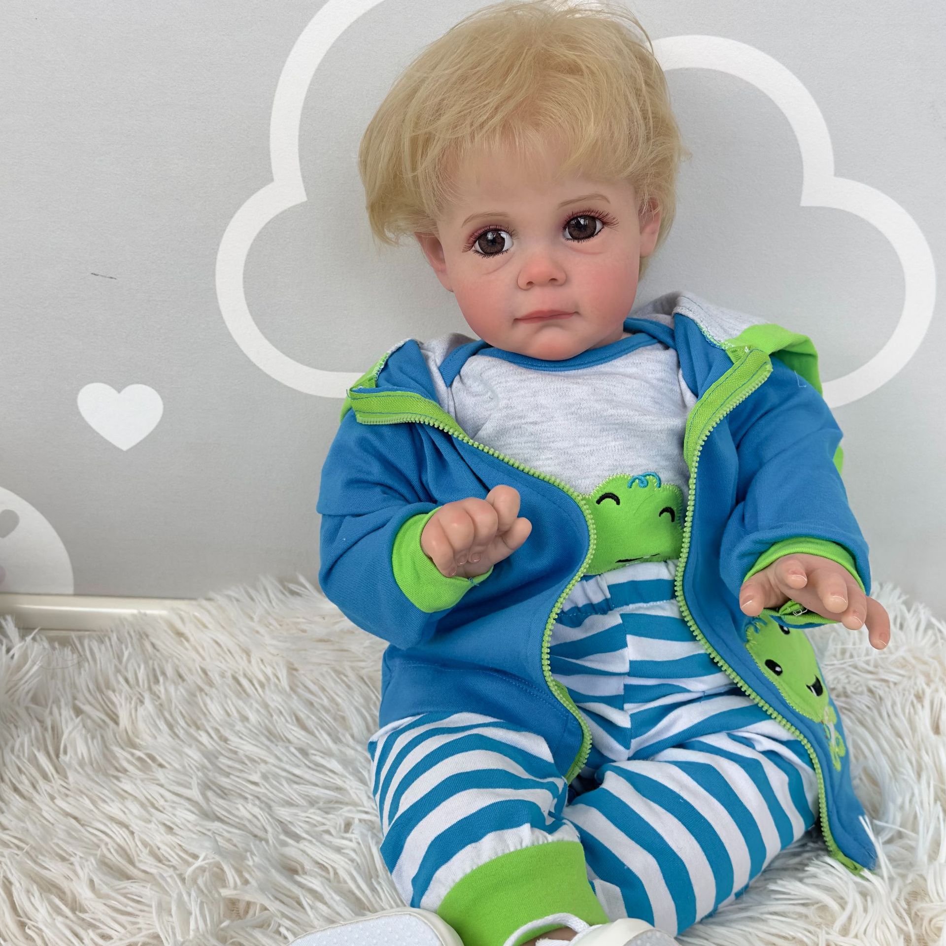 60cm simulación muñeca renacer niño Maddie transfronterizo e-commerce suministro entrega de una sola pieza