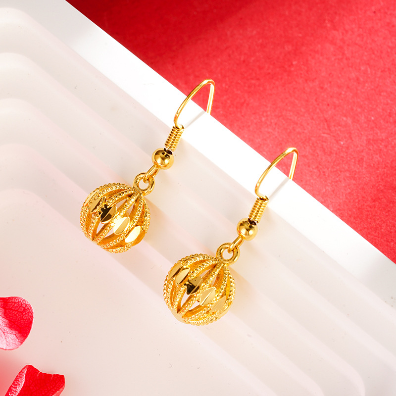 Bola hueca gancho de oreja de moda para mujer pendientes de todo fósforo pendientes de bola redonda luz nicho de lujo de alto grado hueco al por mayor Vietnam arena oro