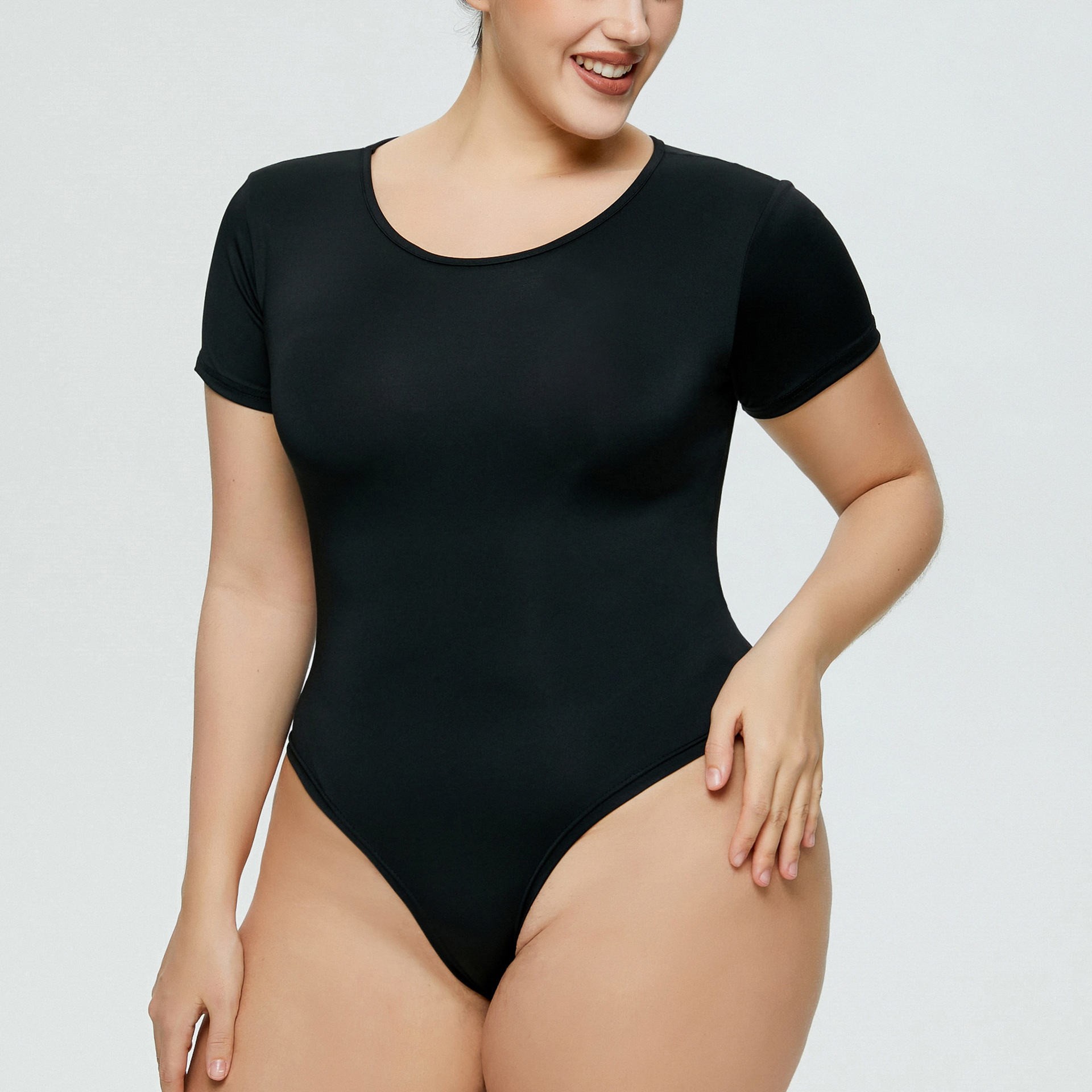 Venta caliente de la manera del comercio exterior europeo y americano más el tamaño de las mujeres bodysuit versátil bottoming cuello redondo de manga corta de una pieza calzoncillos