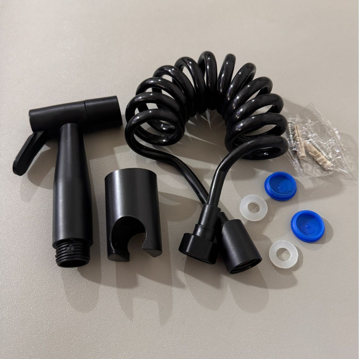 Grey high-pressure spray gun companion, bathroom flushing, handheld nozzle, toilet, feminine wash, small showerhead undefined