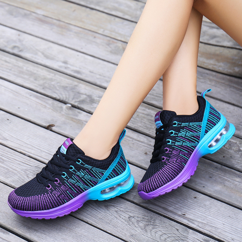 Zapatos de mujer transfronterizos primavera nueva malla voladora tejida transpirable ligero cojín de aire zapatilla de deporte de estilo coreano de las mujeres zapatos de correr casuales para estudiantes