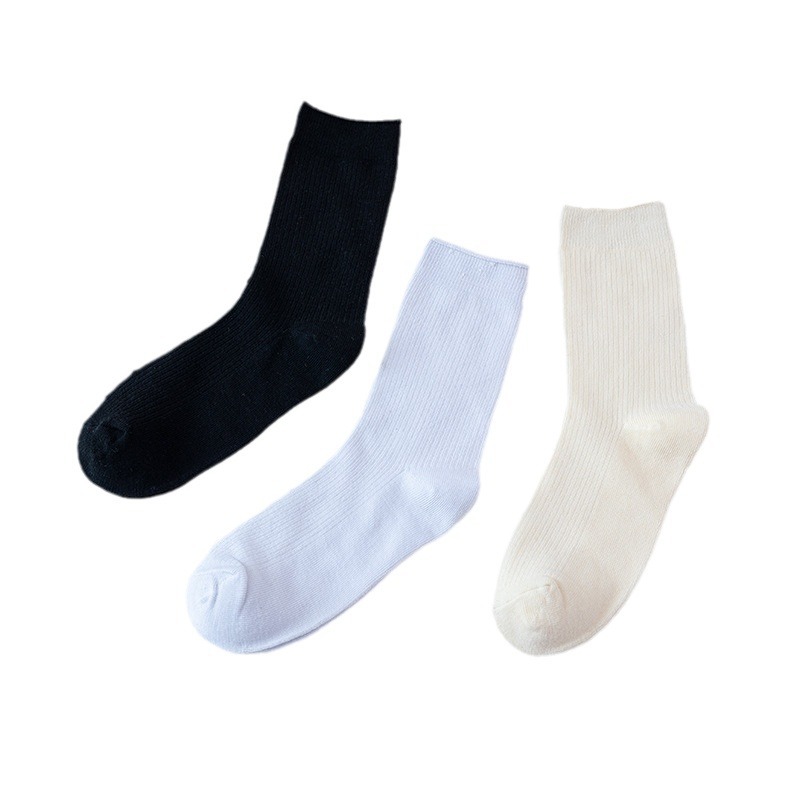 Otoño e Invierno de color sólido de las mujeres JK Lolita calcetines japoneses de punto calcetines cálidos de media pantorrilla Medias Blancas de las mujeres del todo fósforo