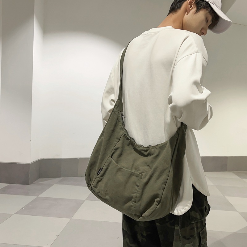 2024 nuevo estilo de ocio, arte, lona de gran capacidad para damas, bolso de mensajero de hombro de viaje de todo fósforo de moda para hombres