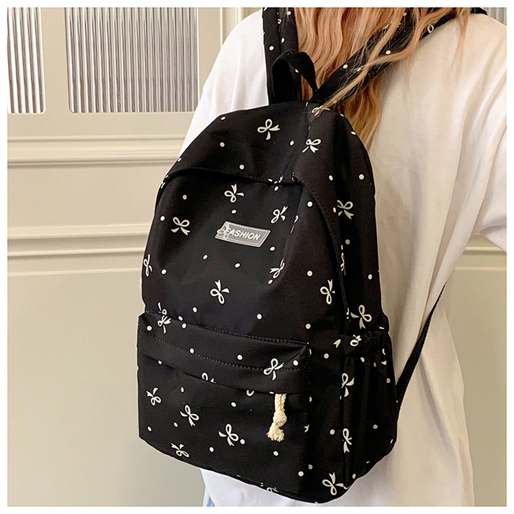 Japanese-style minimalist casual large-capacity backpack for middle and high school students, lightweight and trendy school daypack for girls
