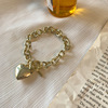 Brand fashionable golden metal bracelet heart shaped, Japanese and Korean, simple and elegant design