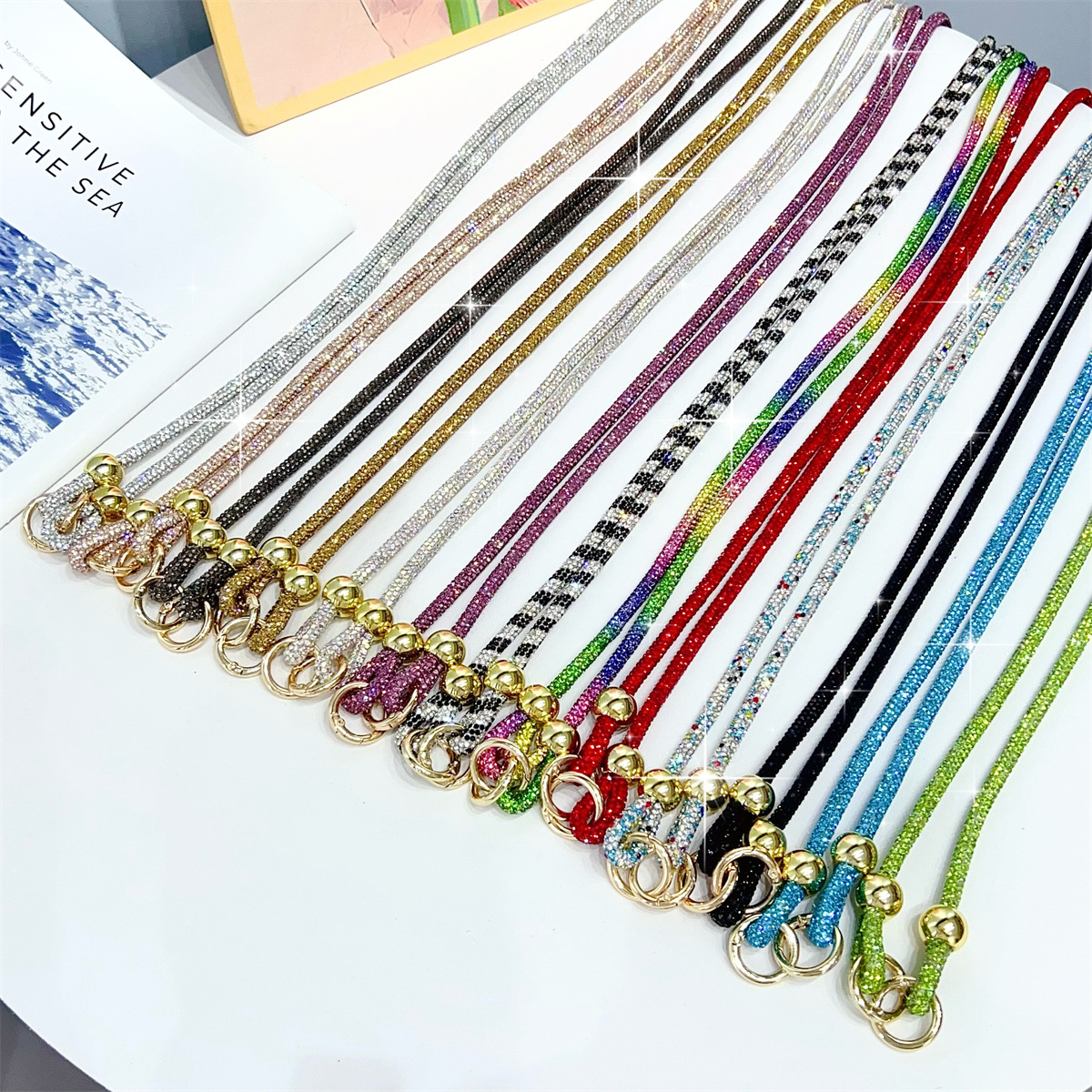 Long rhinestone beaded mobile phone charm, crossbody strap, gold bead bag pendant, hot-selling export item for women.