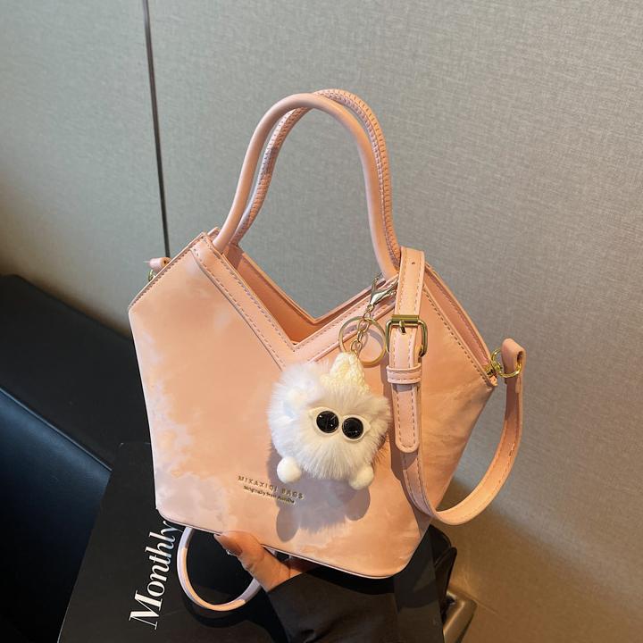 Bolsa de diseño de nicho para mujeres de gran capacidad 2025, nuevo bolso de cubo casual universal bolso de hombro casual de mano