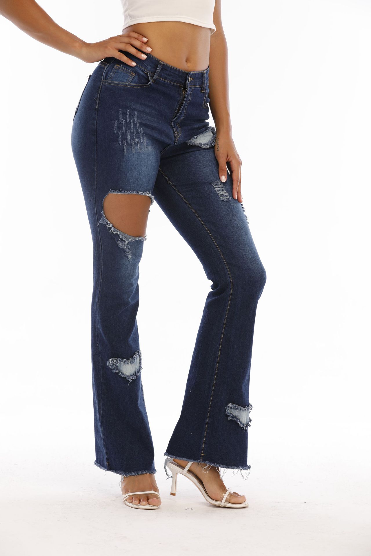 new hole frayed heart-shaped jeans nihaostyle clothing wholesale NSTH69134