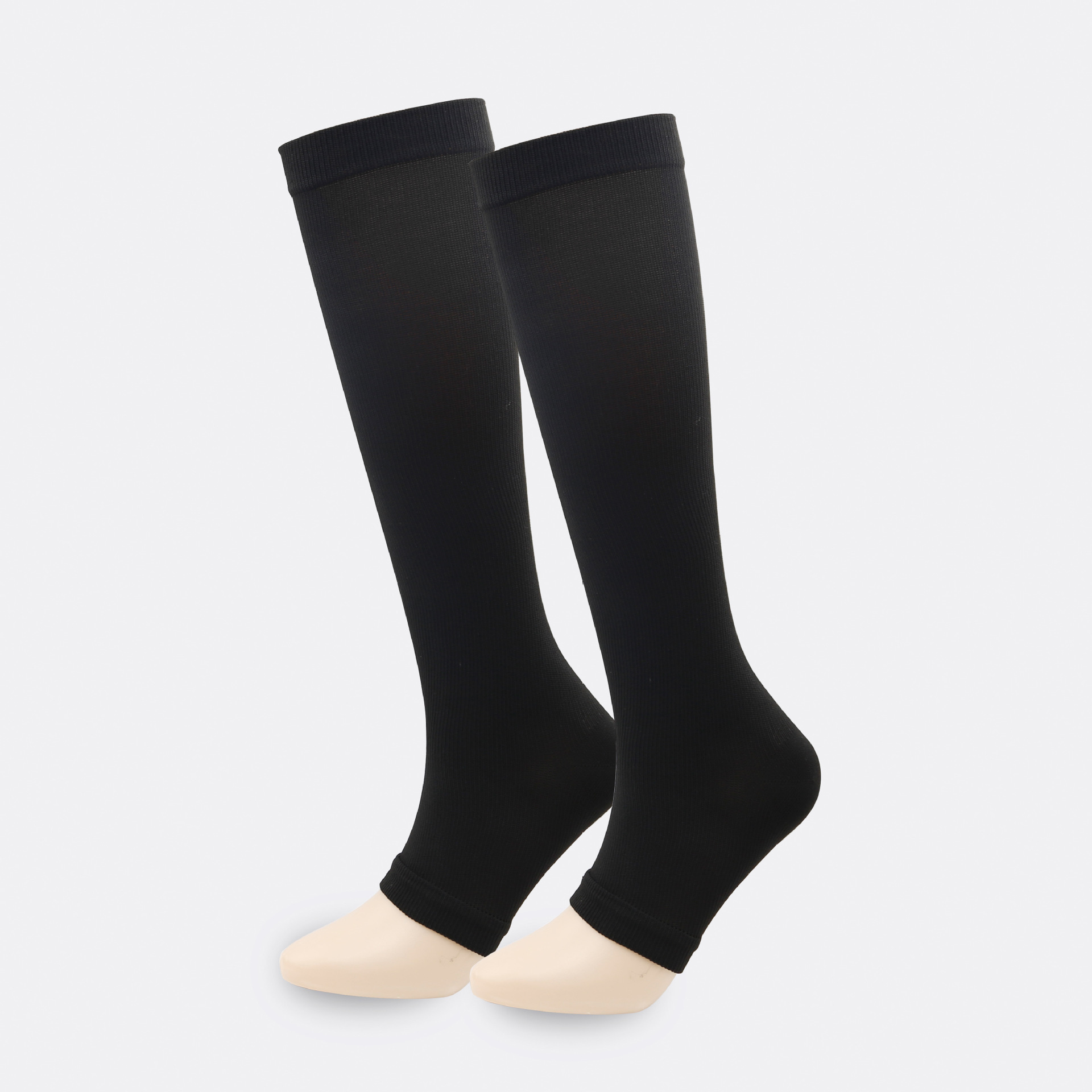 Calcetines de compresión deportivos al aire libre transfronterizos europeos y americanos hombres y mujeres de moda en blanco y negro que ejecutan calcetines de compresión elásticos con punta abierta en stock al por mayor