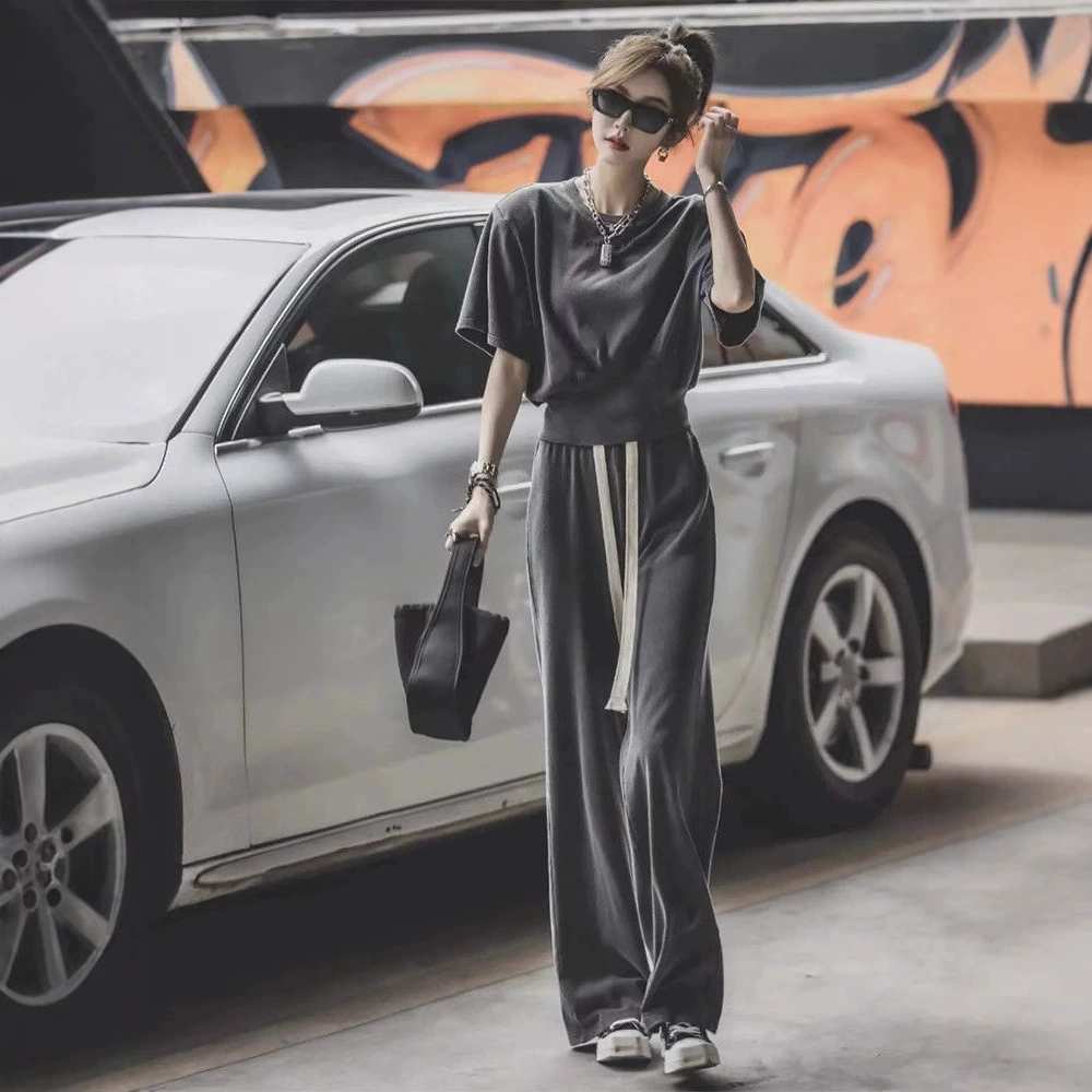 588 # Модный летний женский комплект 2025 года: стильная высококачественная футболка с коротким рукавом и широкие брюки для стройного силуэта.