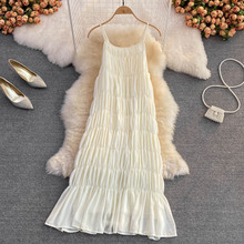 外贸海滨度假无袖无背a字雪纺连衣裙法式桔黄色吊带长裙宽松修身