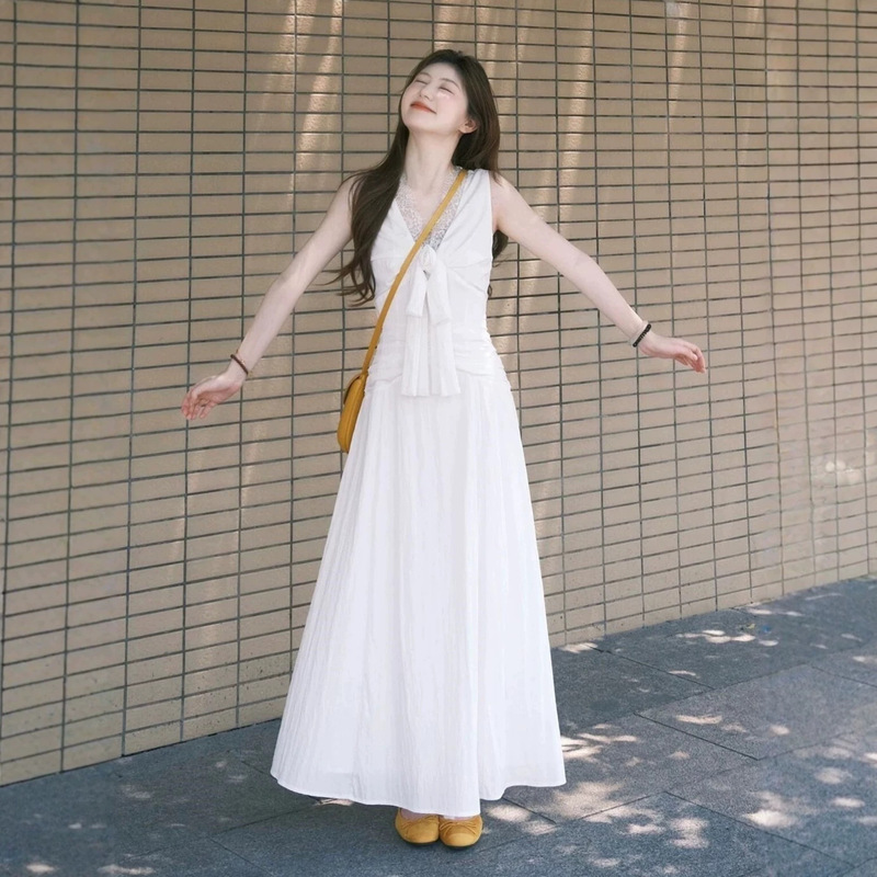 Sleeveless white bow long dress for women, 2026 new model, extremely beautiful, early spring, gorgeous French style, waist-cinching Sleeveless white bow long dress for women, 2026 new model, extremely beautiful, early spring, gorgeous French style, waist-cinching