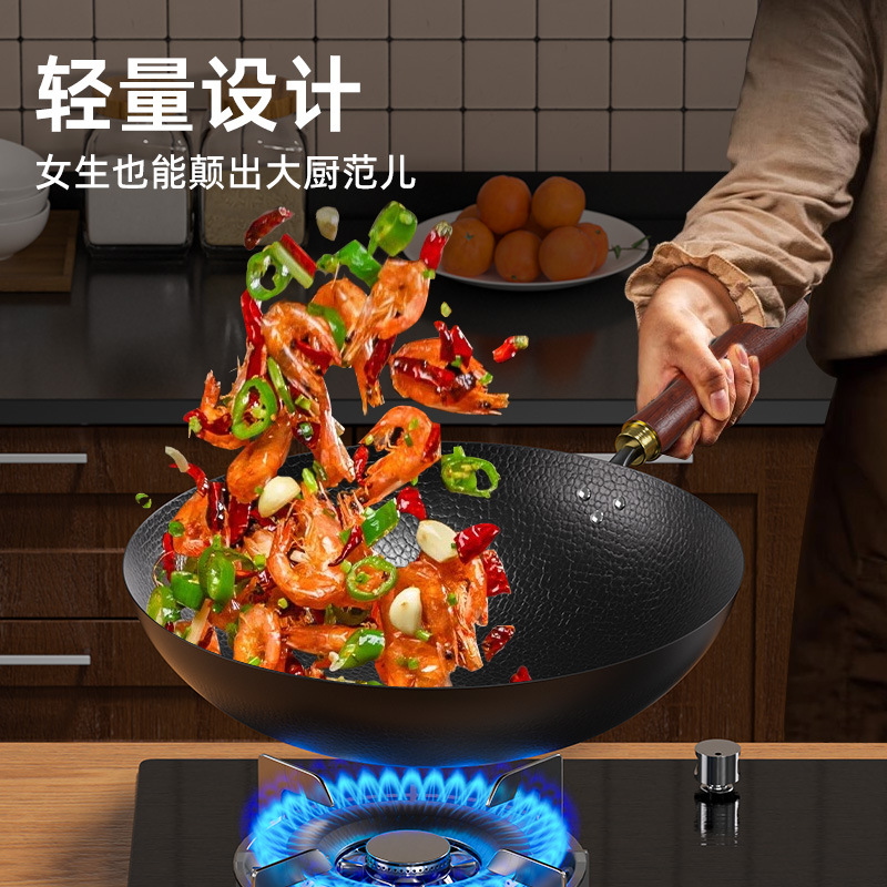 Nuevo tipo de olla de hierro tradicional forjada a mano sin recubrimiento antiadherente olla de horno general olla de hortalizas casera olla de frita