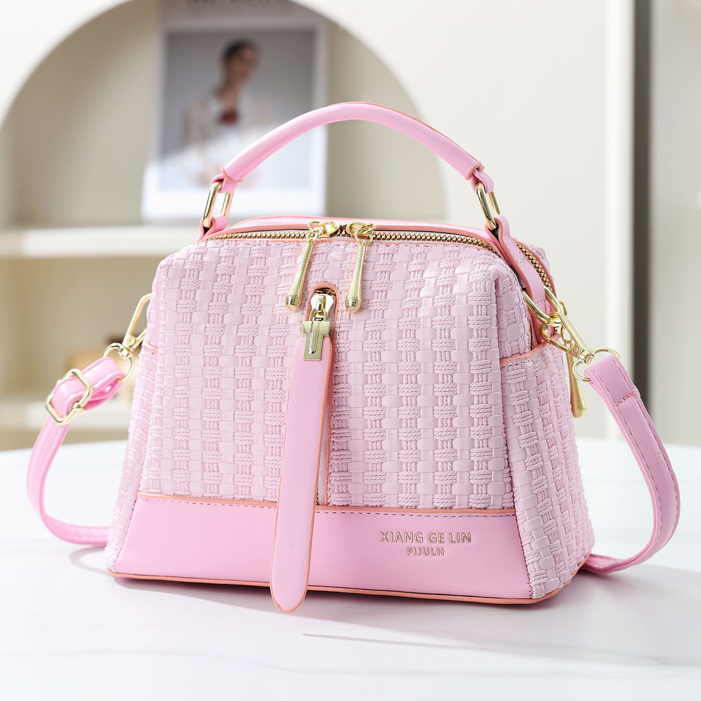 2026 nuevo temperamento de moda tejido bolso de mano textura casual mochila de hombro de gran capacidad bolso de viaje