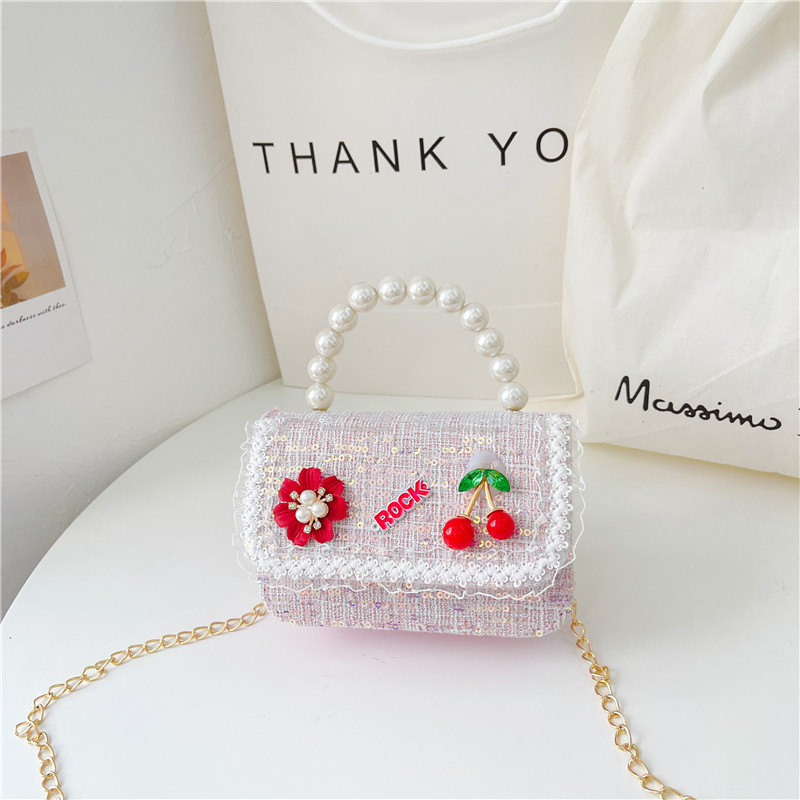 Nuevo bolso de los niños al por mayor Chunxi nuevo arco accesorios bolsa niña fuera monedero crossbody bolsa