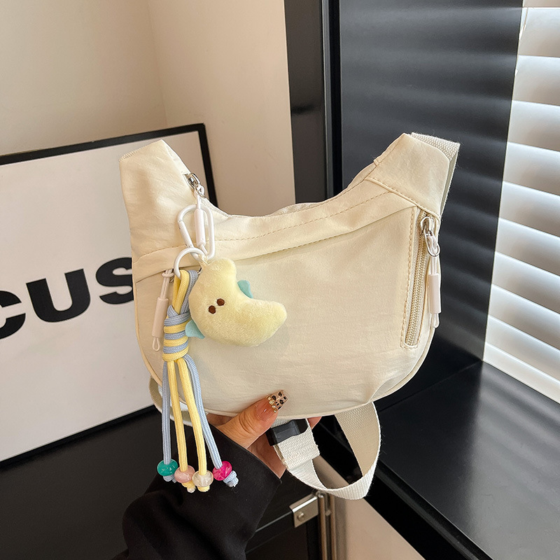 Bolsa de hombro deportiva casual coreana para hombres y mujeres, bolsas de bolsas de bolsas para niños de color sólido.