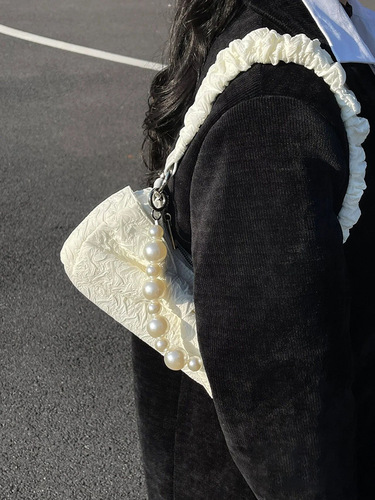 Internet celebrity super popular bow pearl chain bag women's niche design pleated handbag armpit bag single shoulder crossbody bag
