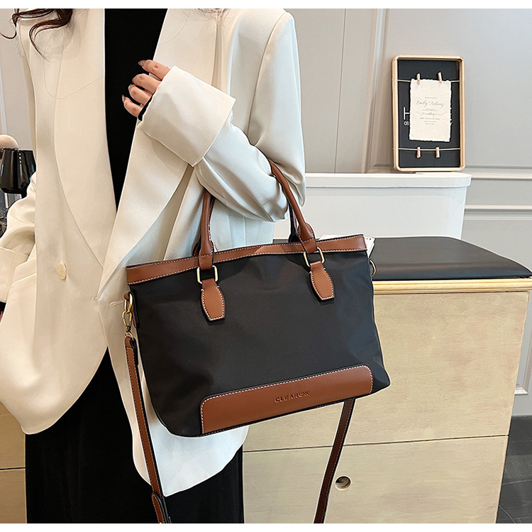 2024 transfronterizo nuevo nylon bolso de mano casual gran capacidad de color retro viaje mochila de hombro