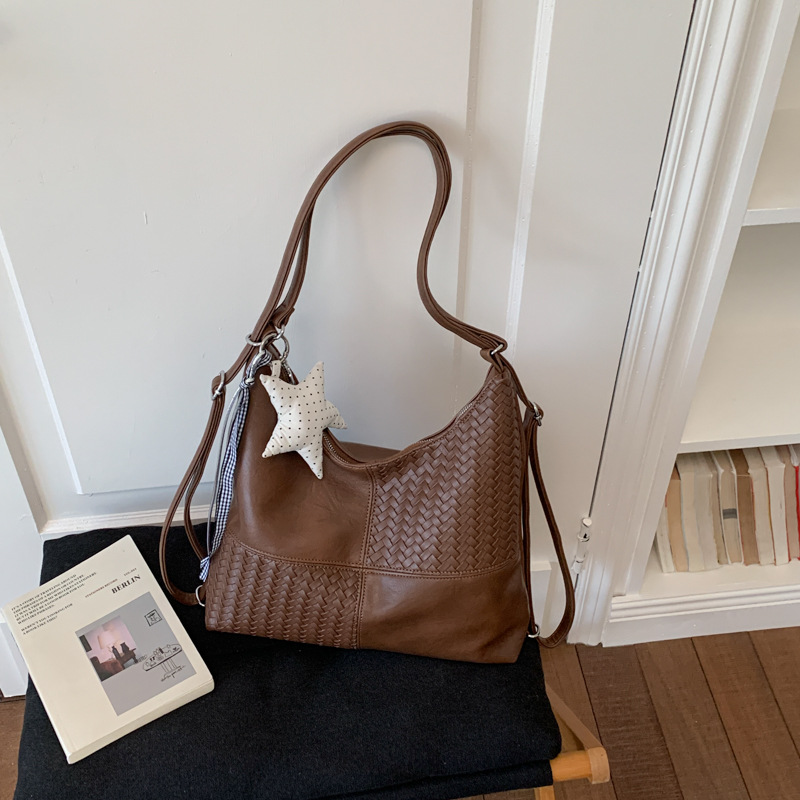 Bolsa multipropósito de gran capacidad para mujeres verano 2026 nueva moda empalme mochila de hombro de viaje bolsa de ocio