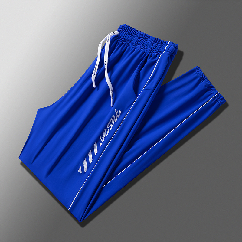 Transmisión en vivo Nueva Cola de seda de hielo pareja Pantalones deportivos drapeado suelto versátil delgado de secado rápido hombres y mujeres de los mismos pantalones Casuales