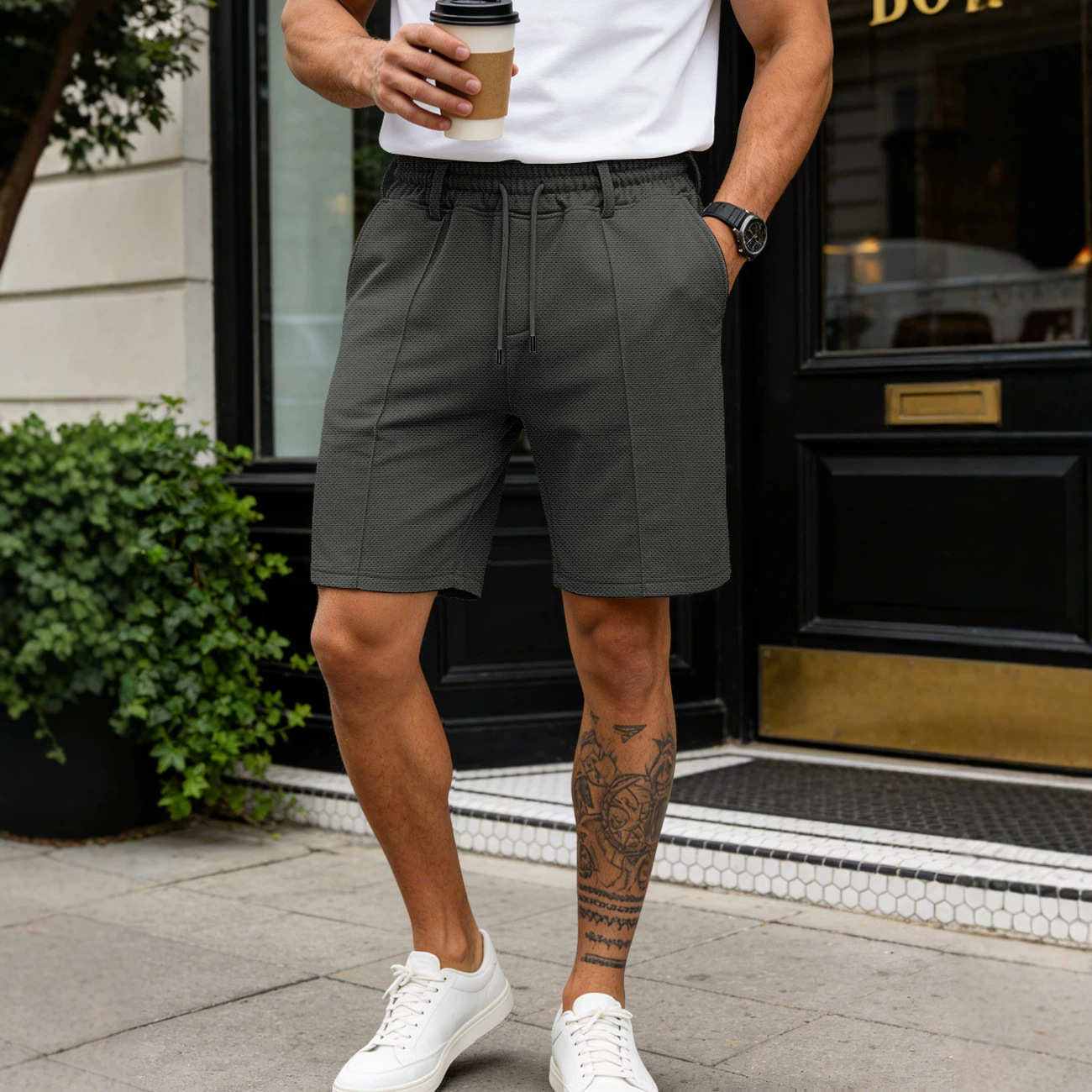 Pantalones cortos de secado rápido de hombre de estación independiente de Europa y América con cuerdas de tirado de piña sueltas y secas rápidas de playa casuales