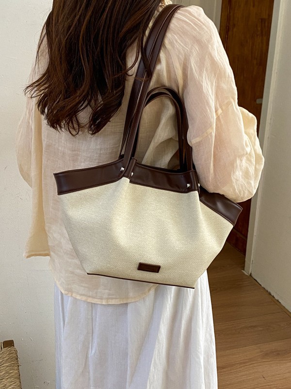 Bolso de mano de gran capacidad para mujeres 2026 nuevo nicho de color de colisión de la bolsa de viaje tote casual simple bolso de hombro axilar