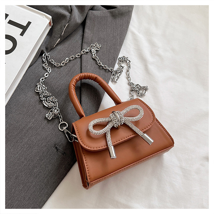 Ins niche French textured bag female 2024 new bow small square bag stylish shoulder messenger bag_voghion.com