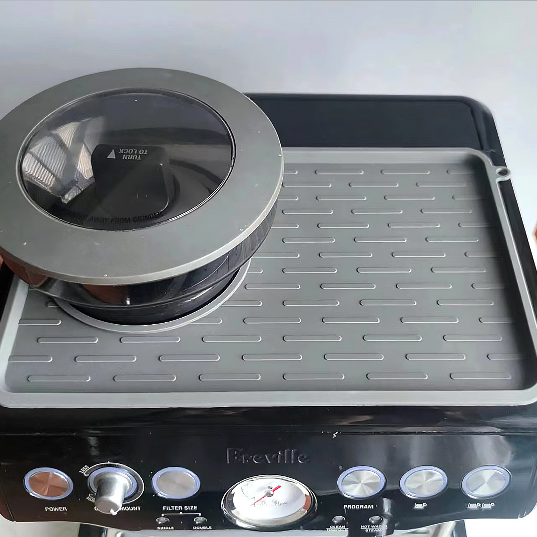 Platino rico 870 / 880 máquina de café superior a prueba de polvo antideslizante silicona almohadilla de aislamiento térmico tela de polvo prensador de polvo mango almohadilla de almacenamiento
