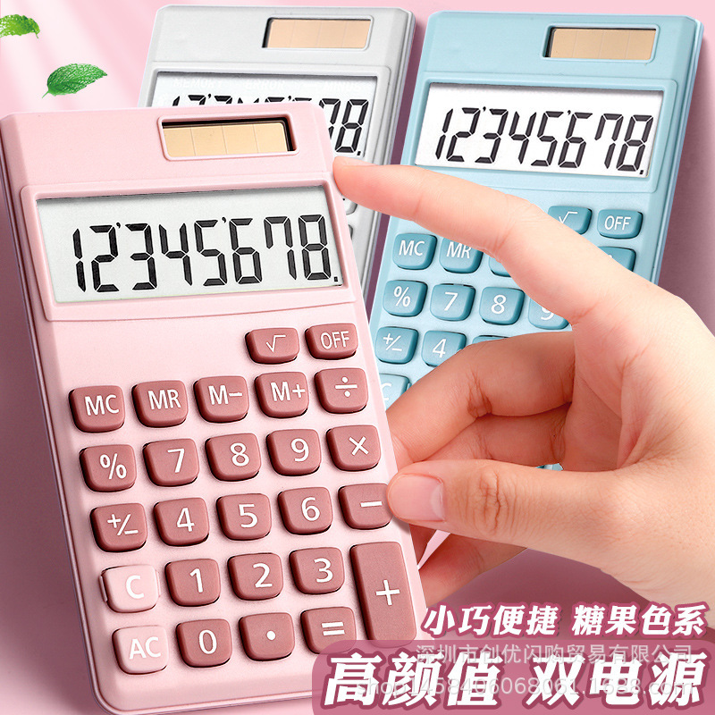 携帯の小さいサイズの電卓は携帯してミニのかわいい計算機のキャンディー色の女子学生の小型の少女の心のコンピュータを携帯します。|undefined