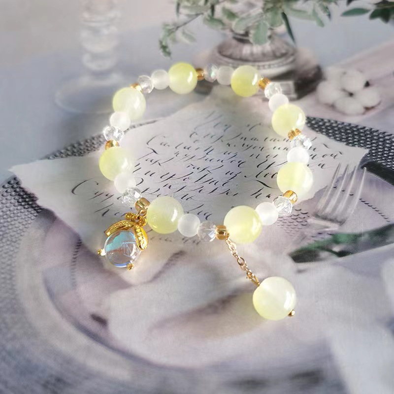 Pulsera de luciérnaga amarilla con hielo