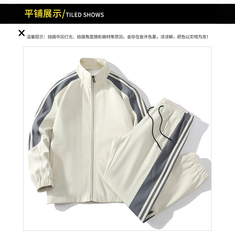 同モデルのケビンクローバー男性は春秋のゆったりとしたシンプルなカジュアルジャケットにアウトドアスポーツのカーディガンをセットしています。|undefined