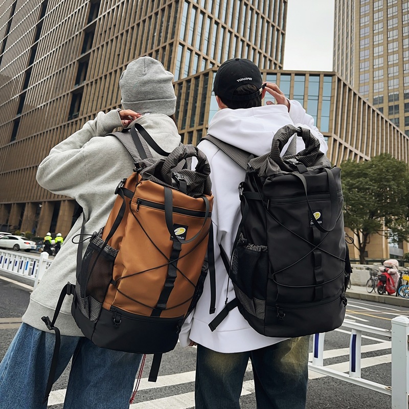 休閒雙肩包男潮牌新款時尚簡約戶外運動旅遊包行李包大容量背包女