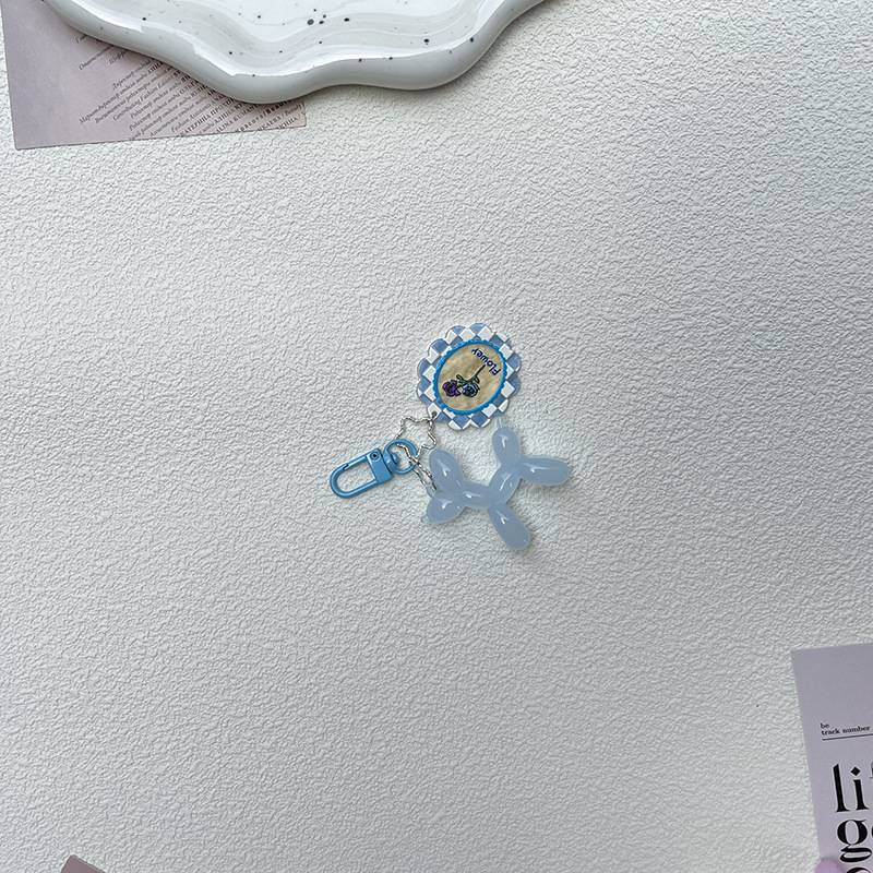 Pequeño Libro Rojo mismo lindo jalea globo láser perro llavero colgante colorido cachorro de dibujos animados teléfono llavero