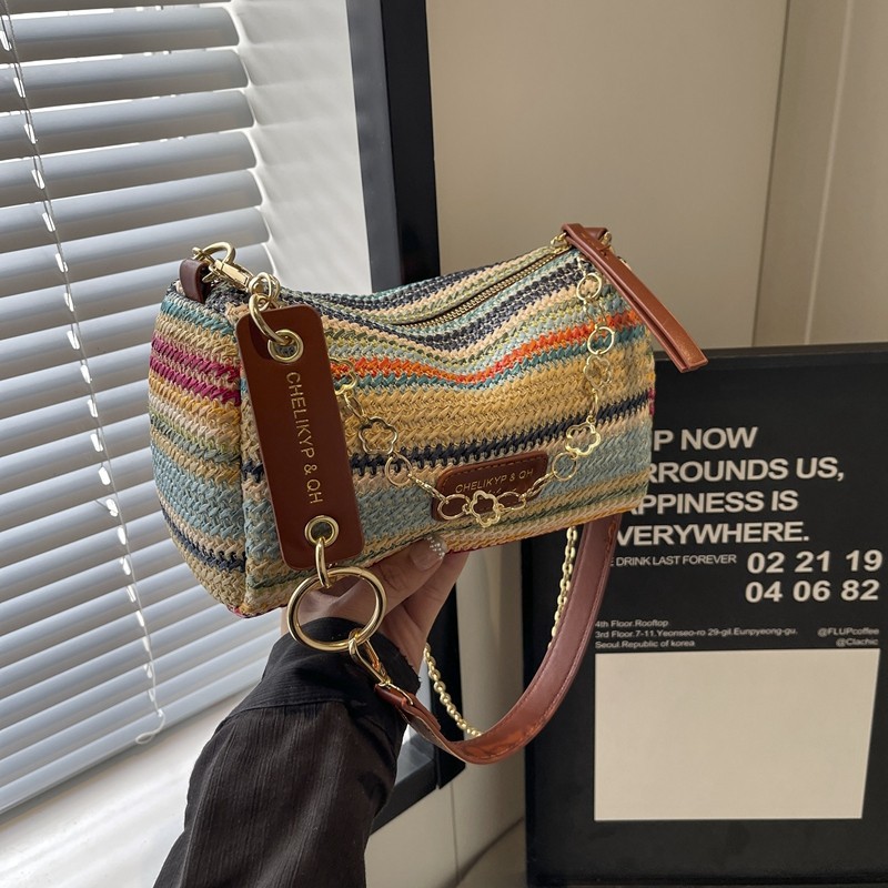 Nicho de diseño sensación de bolso de paja para mujeres verano 2024 nuevo popular bolso de cadena de hombro bolso de brazo