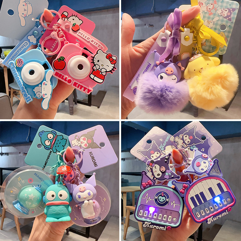 Genuine cartoon Sanrio HelloKitty doll drifting bottle keychain Yugui dog projection camera bag pendant