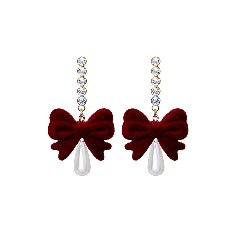 Aguja de plata Otoño e Invierno rojo vintage flocado arco borla pendientes ins Año Nuevo vino rojo Bola de piel pendientes de perlas