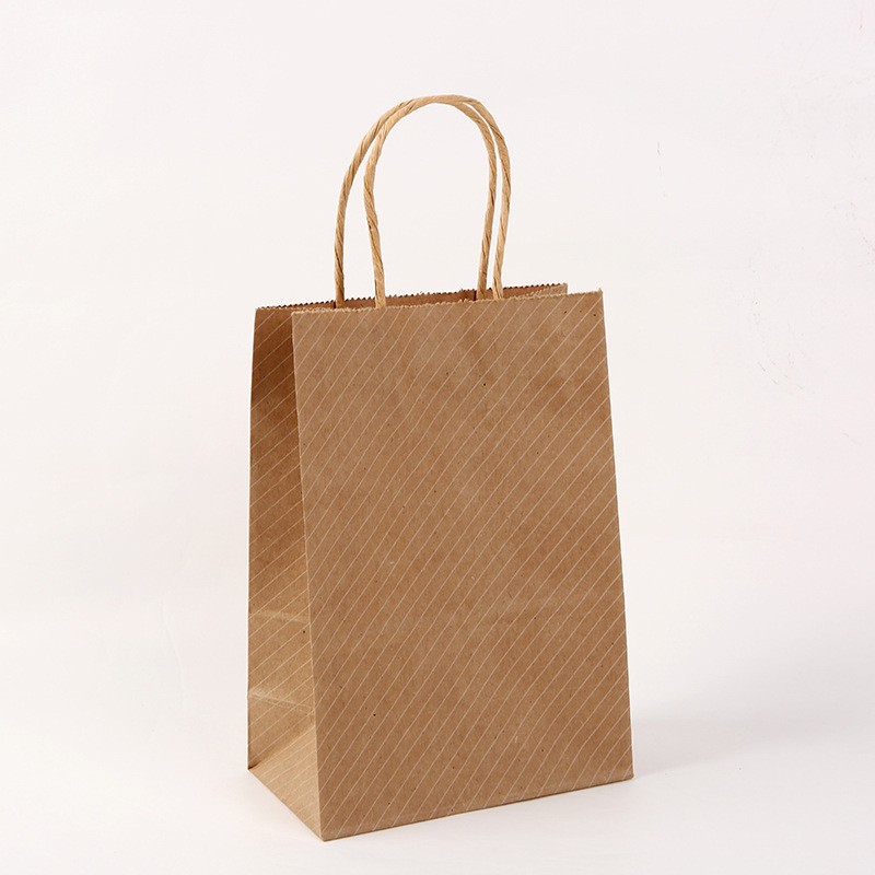 Bolsas de regalo de la serie de papel kraft con rayas onduladas y lunares, bolsas de mano para empaque de té con leche, venta directa de fábrica de papel kraft