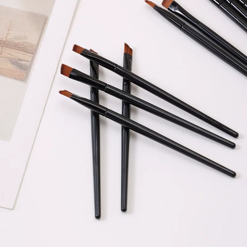 Makeup Brush handheld black, plastic handle, angled small brush for primer and eyeliner
