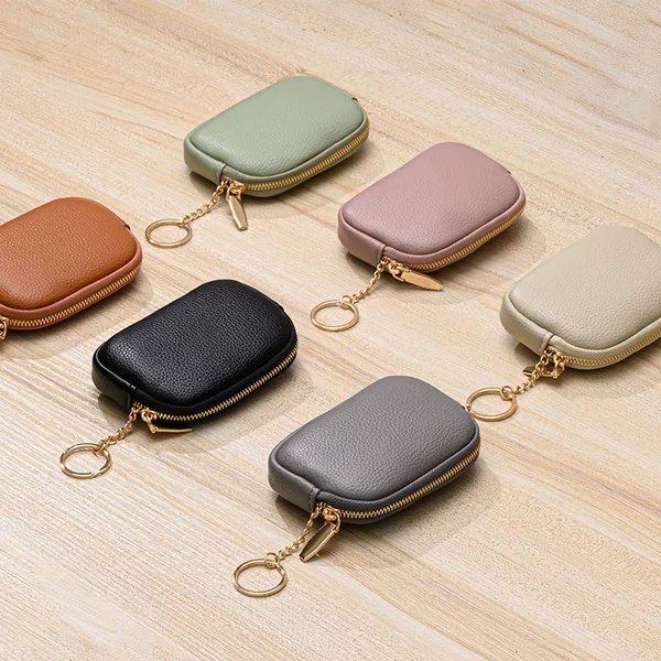 Cross-border hot sale 2023 new women's cute coin purse coin bag mini storage bag earphone bag keychain