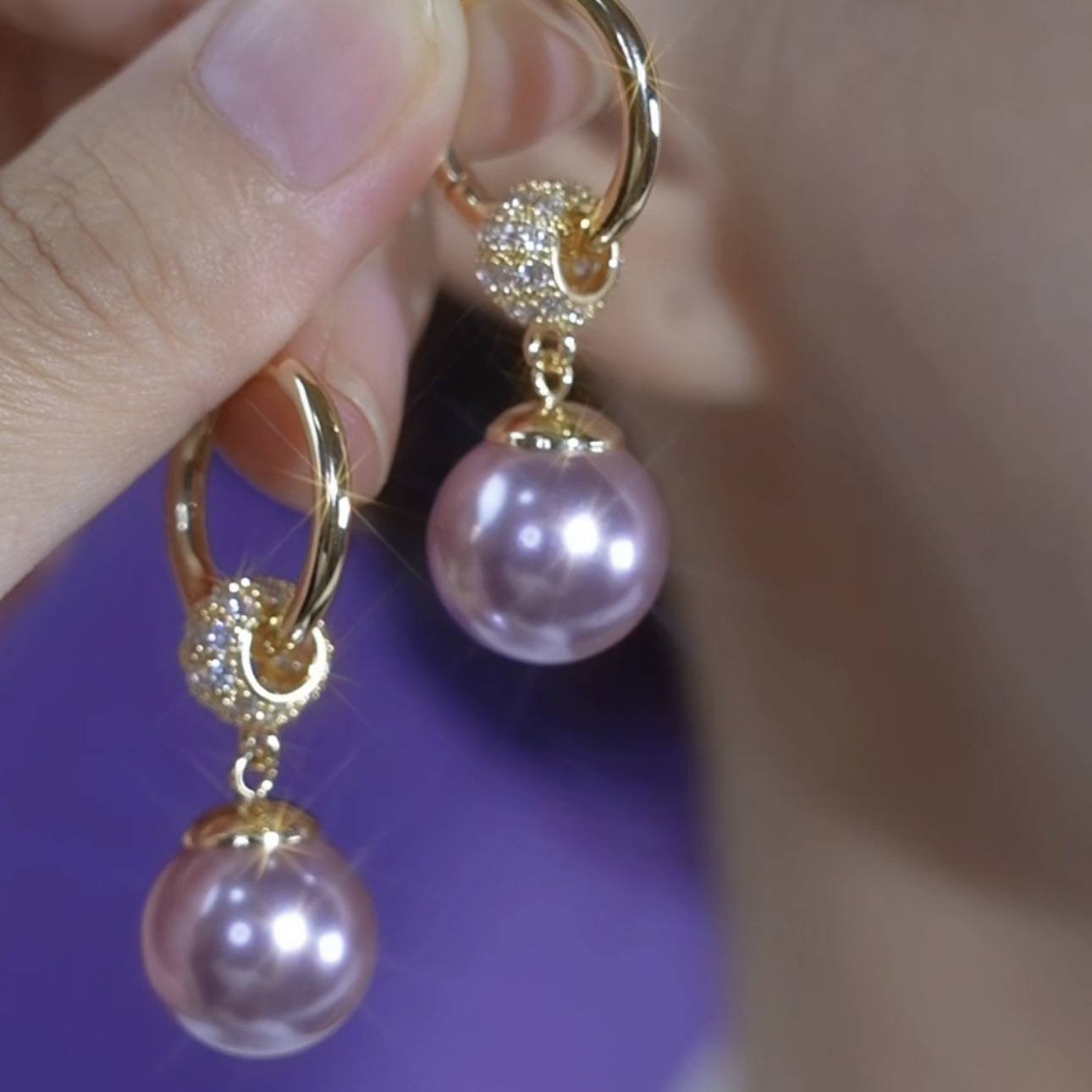 复制_设计感镶钻紫色珍珠耳环女时尚百搭耳扣高级.jpg