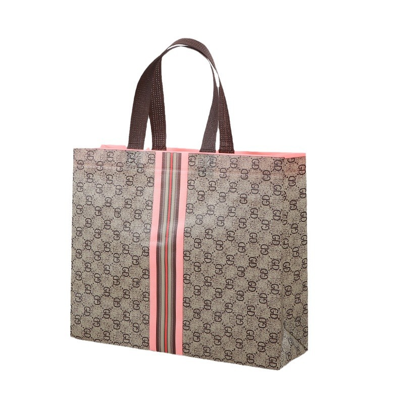 Bolsa de tela no tejida portátil gruesa bolsa de embalaje tridimensional resistente al desgaste de gran capacidad de equipaje de dormitorio de estudiantes bolsa de mano
