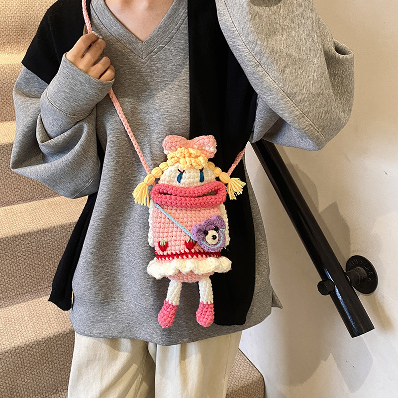 Bolsa de hombro de niñas gancho de lana terminada, muñeca de boca grande linda, mochila, otoño y invierno, nueva bolsa para niños