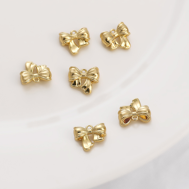 Cross-border 14K gold-wrapped copper bow pendant handmade diy bracelet necklace color-retaining three-dimensional jewelry accessories pendant