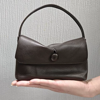 特R0W胎牛皮Sally Bag 2025新款小众手拎信封黑圆扣翻盖小包高级