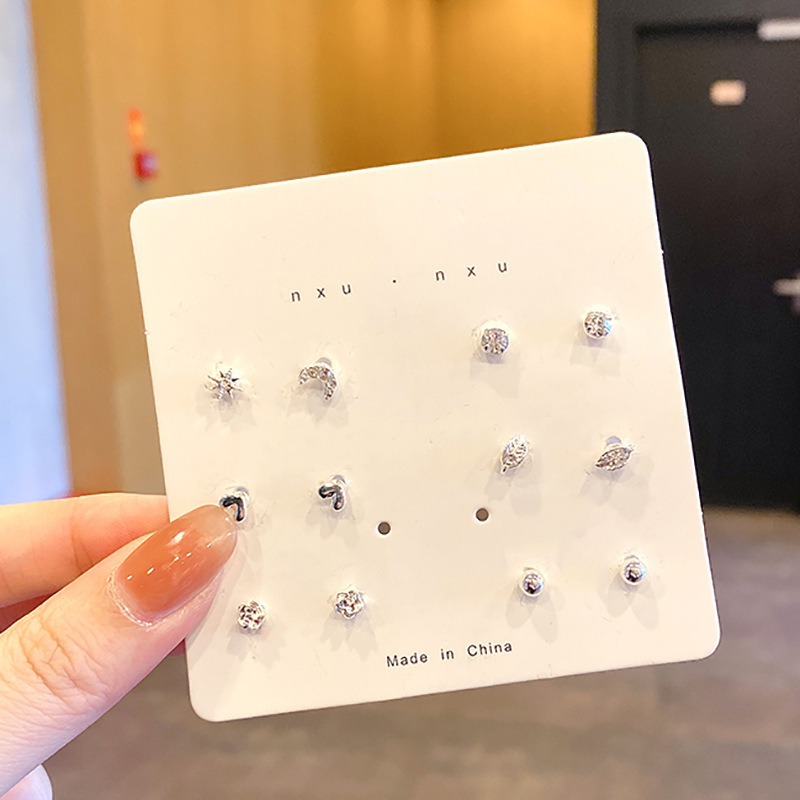 Luz de lujo de alto nivel nicho de diseño femenino sensación de aretes de bordilla temperamento perla asimetría joyería perla al por mayor